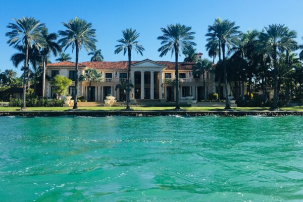 South Florida waterfront home with lush tropical landscaping